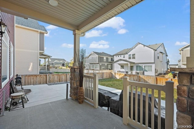 10909 Memphis Ct, Commerce City, CO 80022 - view of patio with a residential view