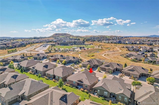 bird's eye view with a mountain view