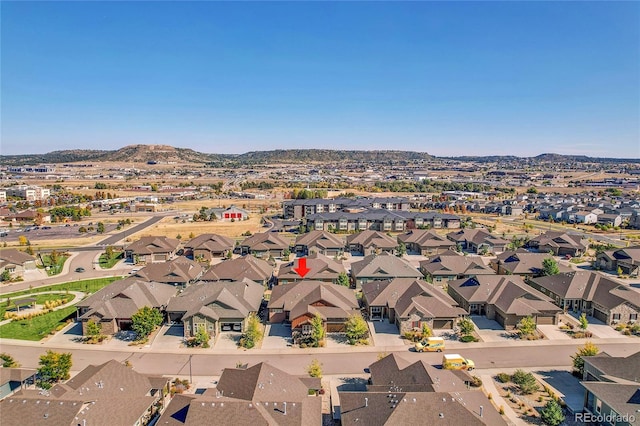 drone / aerial view featuring a mountain view