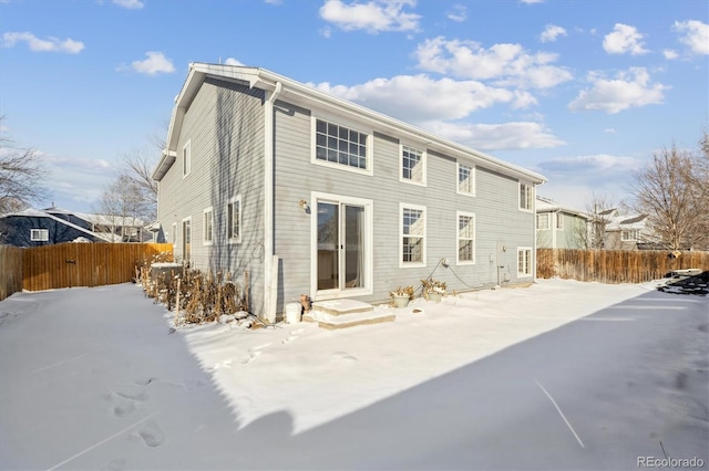 view of snow covered house