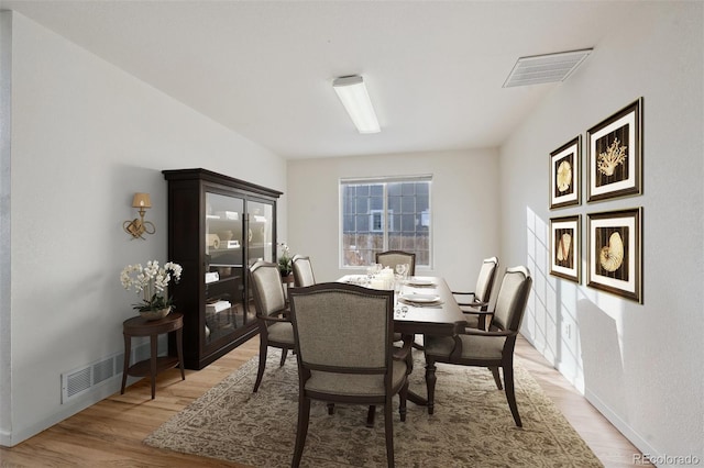 dining area featuring light hardwood / wood-style floors