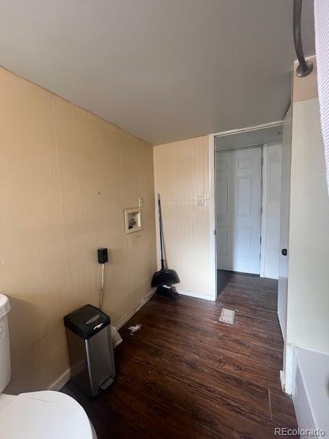 laundry room with hookup for a washing machine and dark hardwood / wood-style flooring