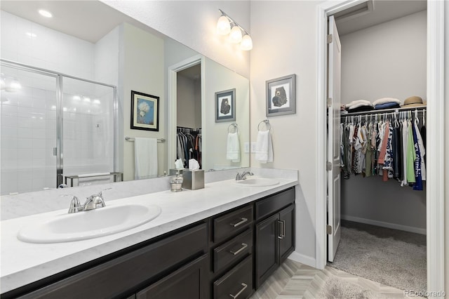 bathroom featuring vanity and walk in shower