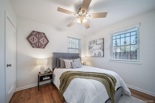 7275 E 8th Ave, Denver, CO 80220 - bedroom featuring wood finished floors, baseboards, and a ceiling fan