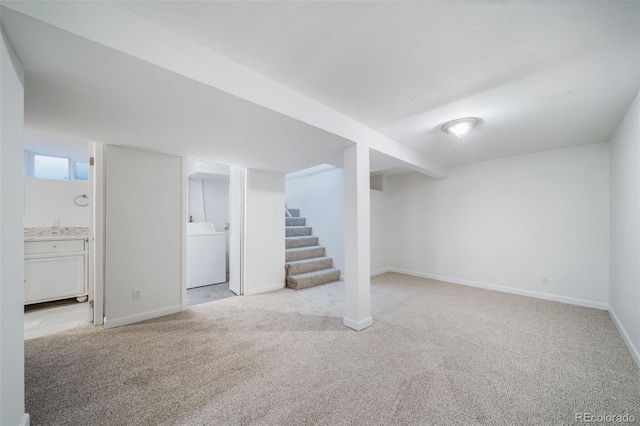 7275 E 8th Ave, Denver, CO 80220 - below grade area with washer / clothes dryer, carpet floors, baseboards, and stairs