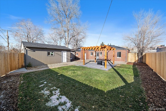 rear view of property with an outbuilding, a pergola, a patio, and a lawn