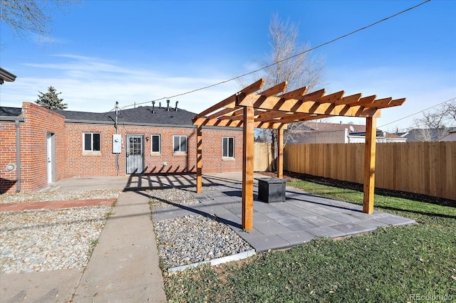 view of patio featuring a pergola