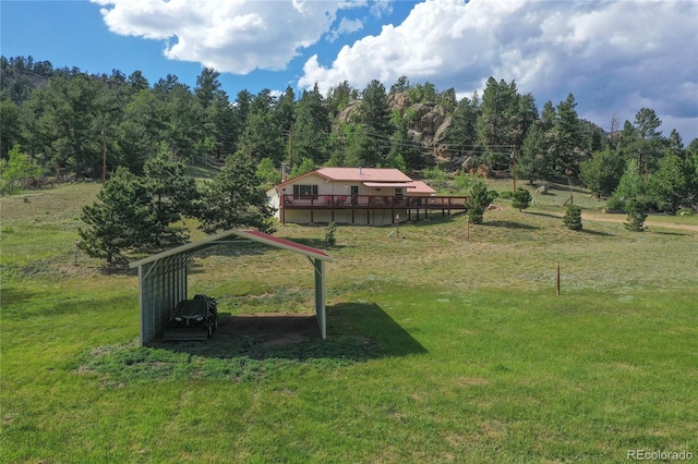 surrounding community featuring a deck and a lawn