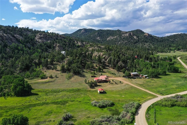 exterior space with a mountain view and a rural view