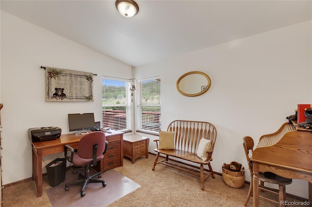 office with carpet and vaulted ceiling