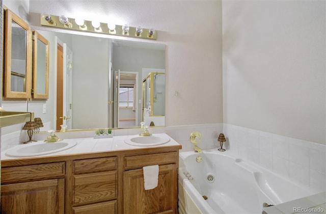 bathroom featuring a bathtub and vanity