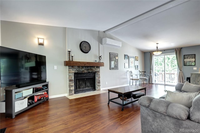 4833 S Pitkin Ct, Aurora, CO 80015 - living area with a wall mounted AC, wood finished floors, a fireplace, and baseboards