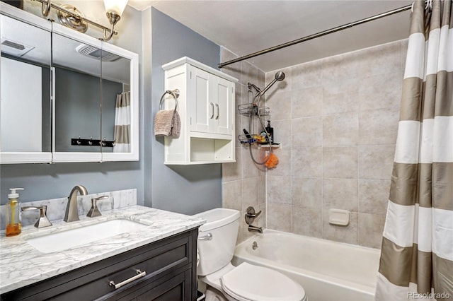 4833 S Pitkin Ct, Aurora, CO 80015 - full bath featuring shower / tub combo with curtain, vanity, and toilet