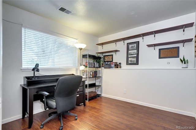 4833 S Pitkin Ct, Aurora, CO 80015 - home office with wood finished floors and baseboards