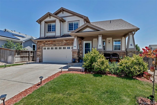 16352 E 104th Way, Commerce City, CO 80022 - craftsman-style home featuring concrete driveway, an attached garage, stone siding, and a porch