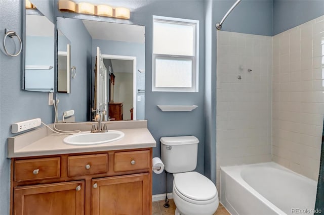 16352 E 104th Way, Commerce City, CO 80022 - full bath featuring vanity, washtub / shower combination, and tile patterned flooring