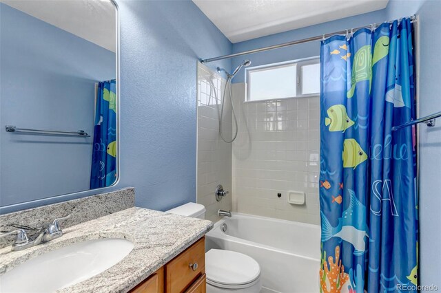 16352 E 104th Way, Commerce City, CO 80022 - bathroom featuring vanity, shower / tub combo with curtain, and a textured wall