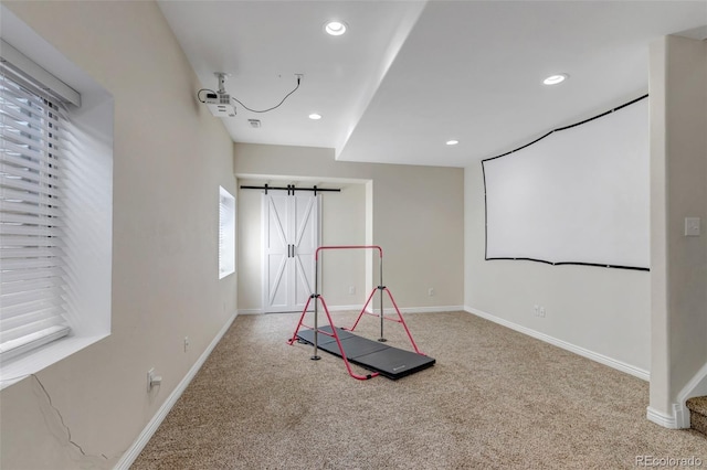 16352 E 104th Way, Commerce City, CO 80022 - game room featuring carpet flooring, a barn door, and recessed lighting