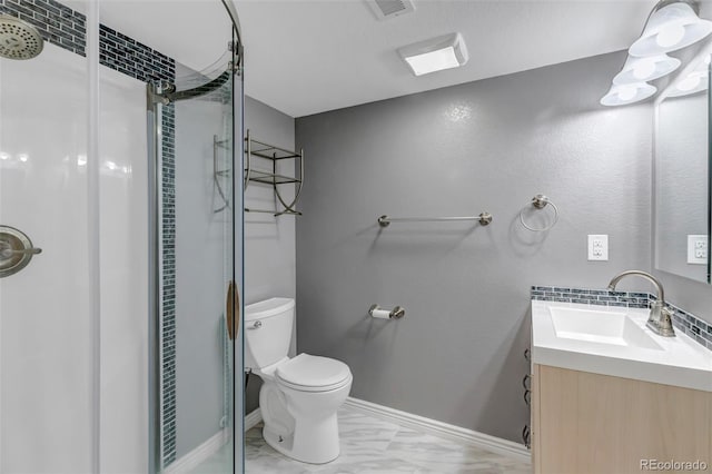 16352 E 104th Way, Commerce City, CO 80022 - bathroom with a stall shower, vanity, and marble finish floors