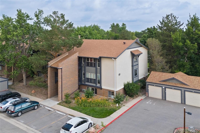 850 W Moorhead Cir Unit 3L, Boulder, CO 80305 - view of front of property with uncovered parking and a shingled roof