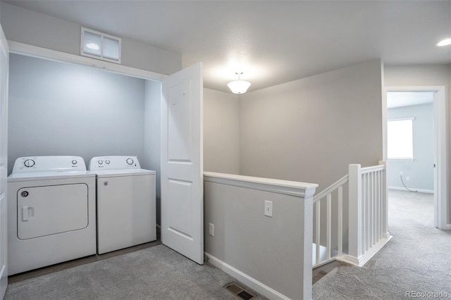 2561 Stage Coach Dr Unit B, Milliken, CO 80543 - laundry area with independent washer and dryer, light colored carpet, and baseboards