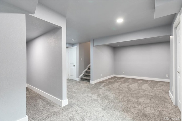 2561 Stage Coach Dr Unit B, Milliken, CO 80543 - finished basement with carpet floors, baseboards, and stairway