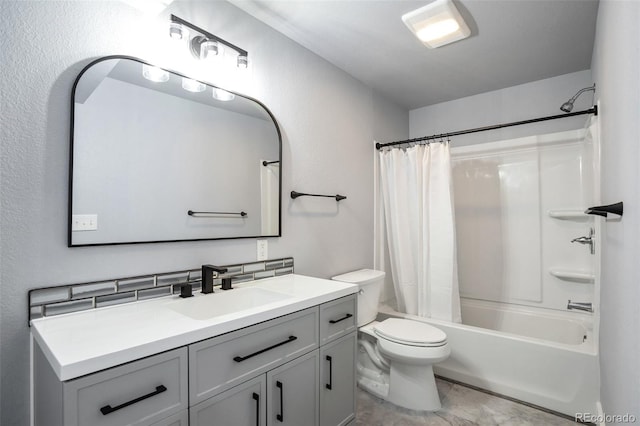 2561 Stage Coach Dr Unit B, Milliken, CO 80543 - bathroom with toilet, vanity, shower / bath combo with shower curtain, and marble look tile flooring