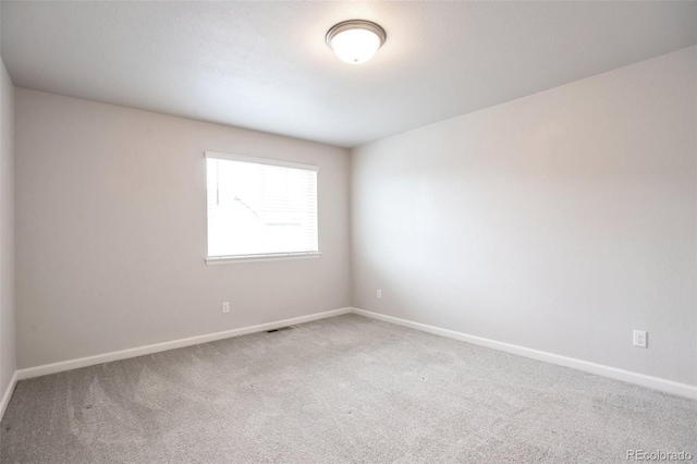 2561 Stage Coach Dr Unit B, Milliken, CO 80543 - unfurnished room with carpet flooring and baseboards