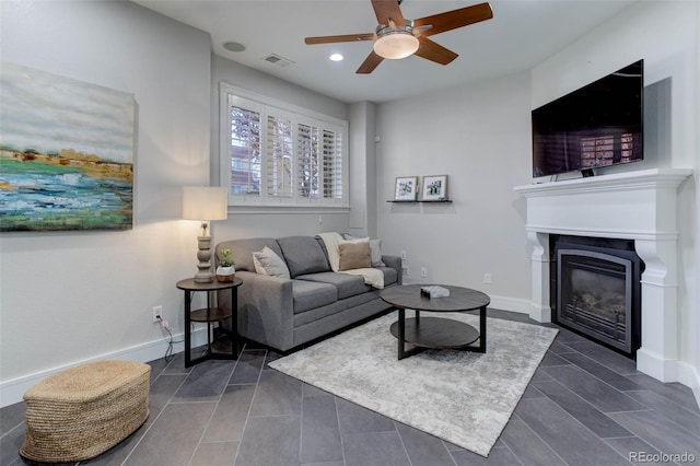 living room featuring ceiling fan