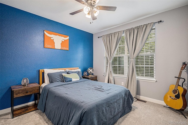 11681 Night Heron Dr, Parker, CO 80134 - carpeted bedroom with baseboards, a textured wall, and ceiling fan