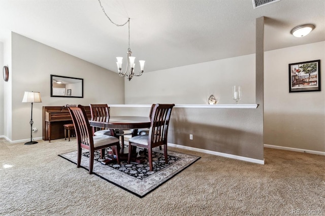 carpeted dining area with lofted ceiling, a notable chandelier, and a textured ceiling