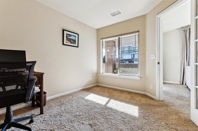 view of carpeted office space