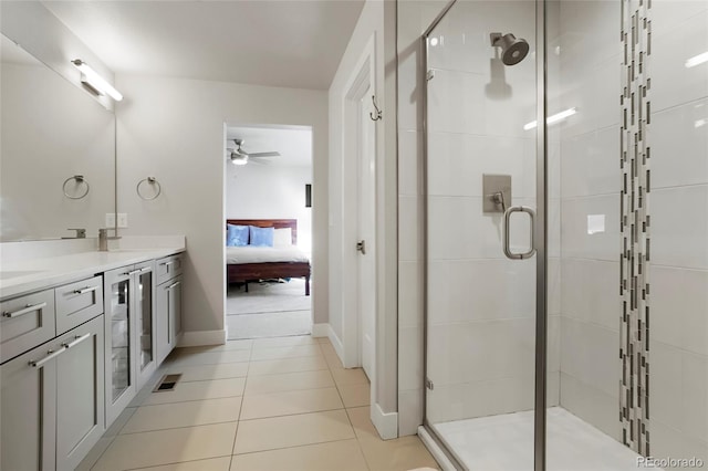 bathroom with vanity, tile patterned floors, an enclosed shower, and beverage cooler