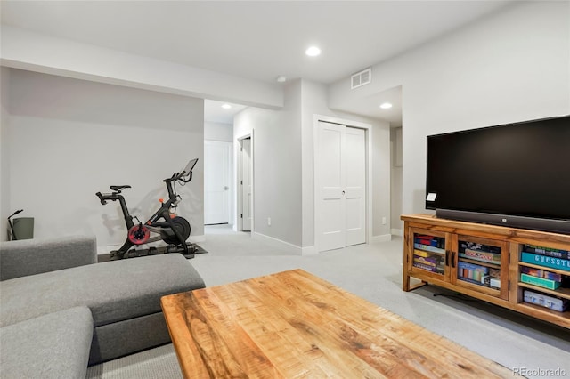 living room featuring light colored carpet