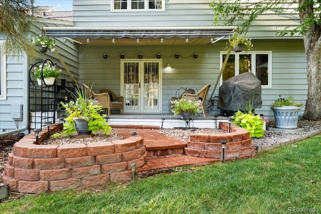 view of exterior entry with french doors