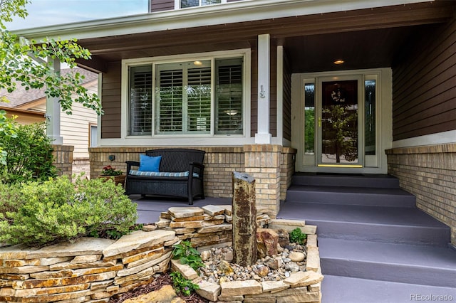 8410 S Oak St, Littleton, CO 80127 - property entrance featuring a porch