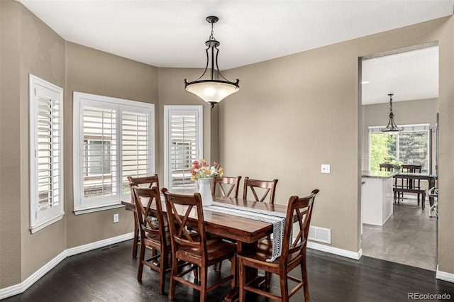 8410 S Oak St, Littleton, CO 80127 - dining area with dark wood-style floors and a textured wall
