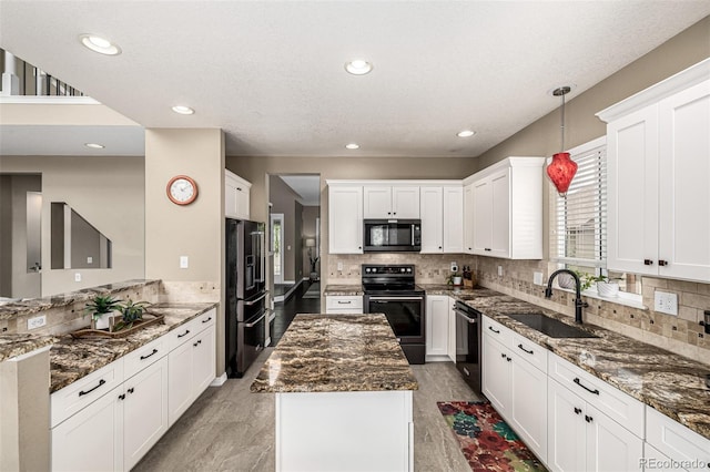 8410 S Oak St, Littleton, CO 80127 - kitchen with black appliances, dark stone countertops, tasteful backsplash, and recessed lighting