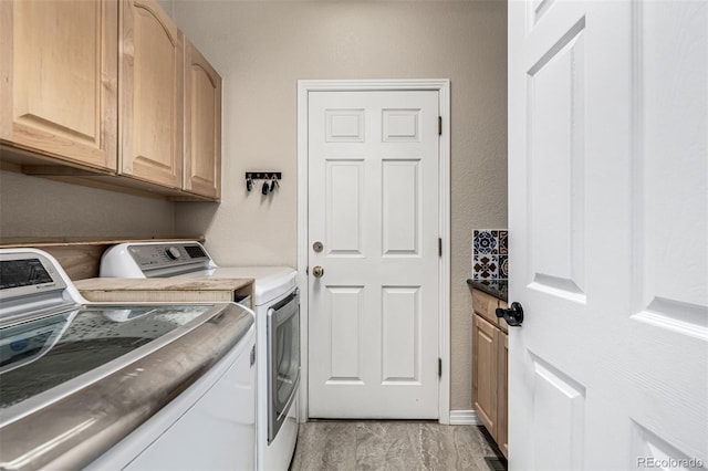 8410 S Oak St, Littleton, CO 80127 - laundry area with washing machine and clothes dryer and cabinet space