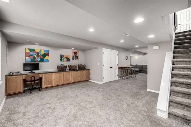 8410 S Oak St, Littleton, CO 80127 - home office featuring light carpet, recessed lighting, and built in desk