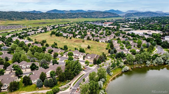 8410 S Oak St, Littleton, CO 80127 - aerial perspective of suburban area featuring a water and mountain view