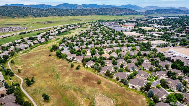 8410 S Oak St, Littleton, CO 80127 - aerial perspective of suburban area featuring a mountain backdrop