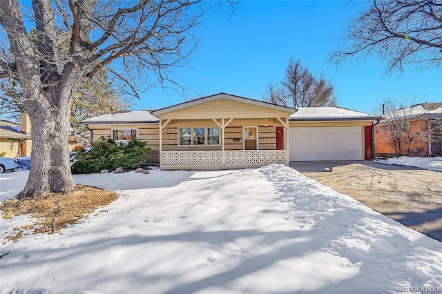 single story home featuring a garage