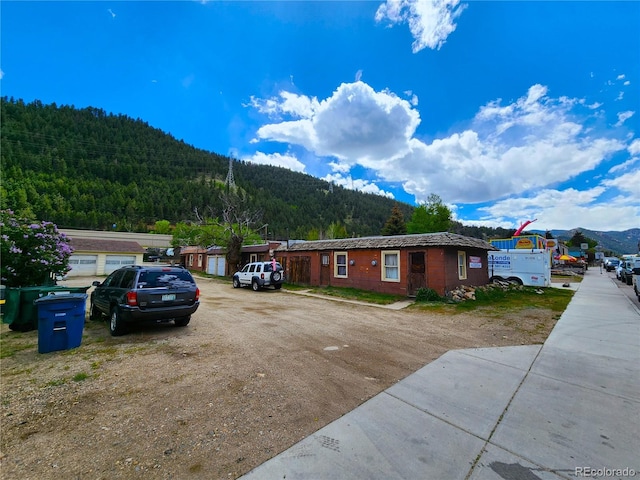 view of front of property with a mountain view