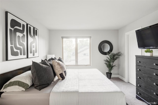 2435 S High St, Denver, CO 80210 - bedroom featuring carpet and baseboards