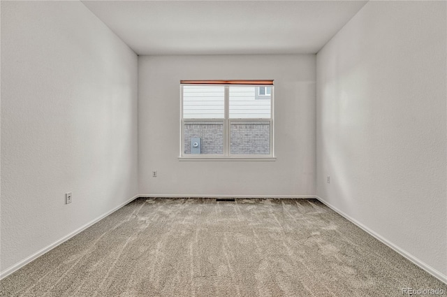 empty room with carpet floors