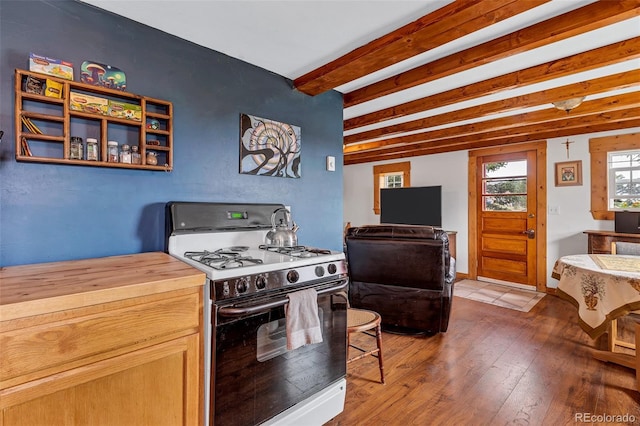 500 Fourth St, Fairplay, CO 80440 - kitchen featuring white gas stove, hardwood / wood-style floors, beam ceiling, and wood counters