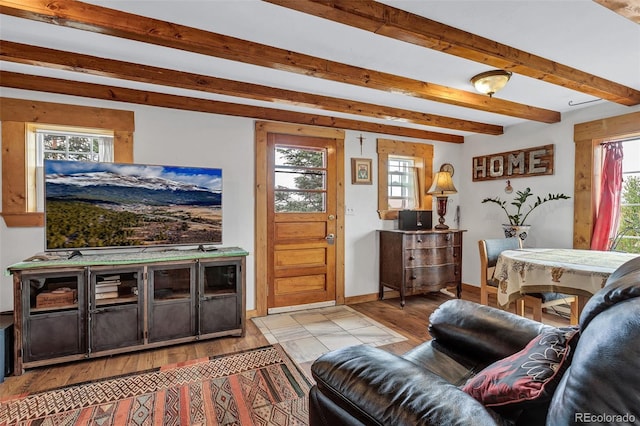 500 Fourth St, Fairplay, CO 80440 - living area with beam ceiling, light wood-style floors, and plenty of natural light