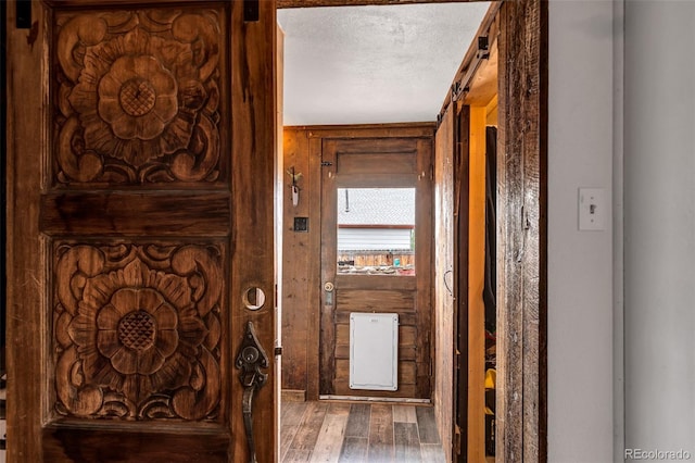 500 Fourth St, Fairplay, CO 80440 - entryway featuring wood finished floors and a textured ceiling