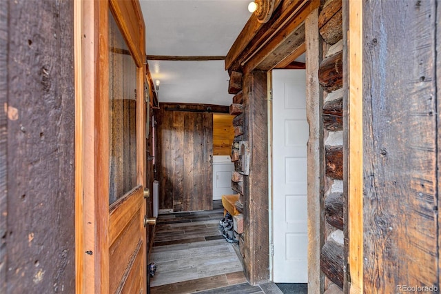 500 Fourth St, Fairplay, CO 80440 - stairway featuring washer / clothes dryer, wood walls, and wood finished floors